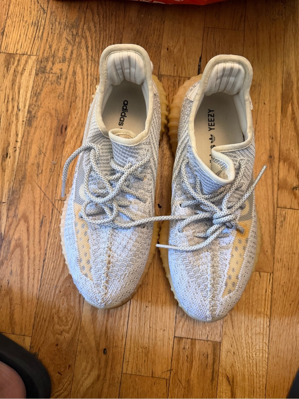 Yeezy Boost Sneakers in Light Gray/Glow in the dark